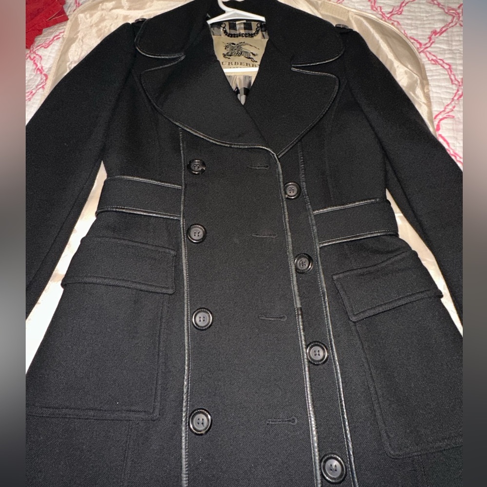Euc  Burberry women’s  coat with leather trim size 4 .